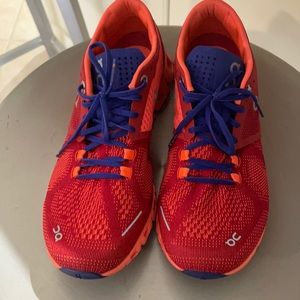 Red/orange/navy On Cloud sneaker.